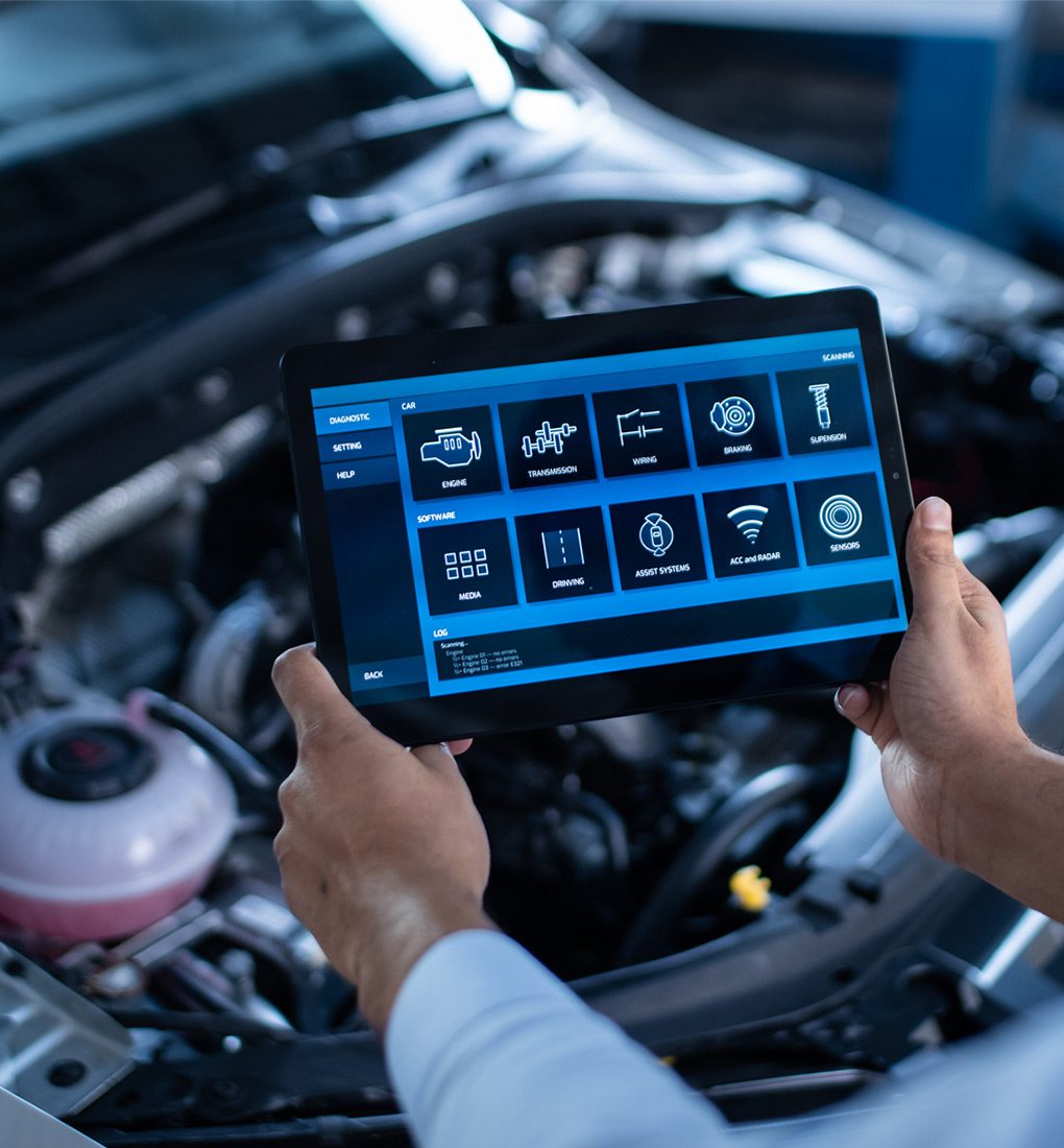 stock-photo-car-service-manager-or-mechanic-uses-a-tablet-computer-with-a-futuristic-interactive-diagnostics-1711212046 Mauro D Andrea